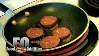 Remy Eats Blood Sausage (Food Oddities - www.foododdities.com)
