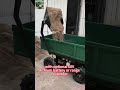 Remotely controlled self scooping self-unloading multi-function carrier