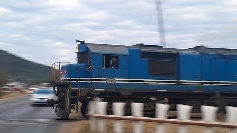 Lobatse Level Crossing. Botswana Railways long haulage heading to Gaborone Station.
