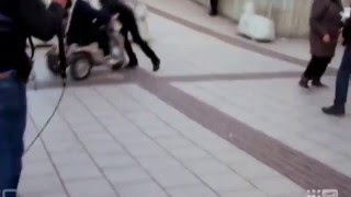 Mobility scooter hero saves CBS 60 minutes from local thug (Rinkeby, Sweden)