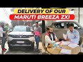 Taking delivery of our 2022 maruti breeza facelift zxi  abhinia auto vlogs