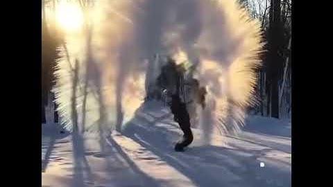 Boiling water meets frost in slow motion