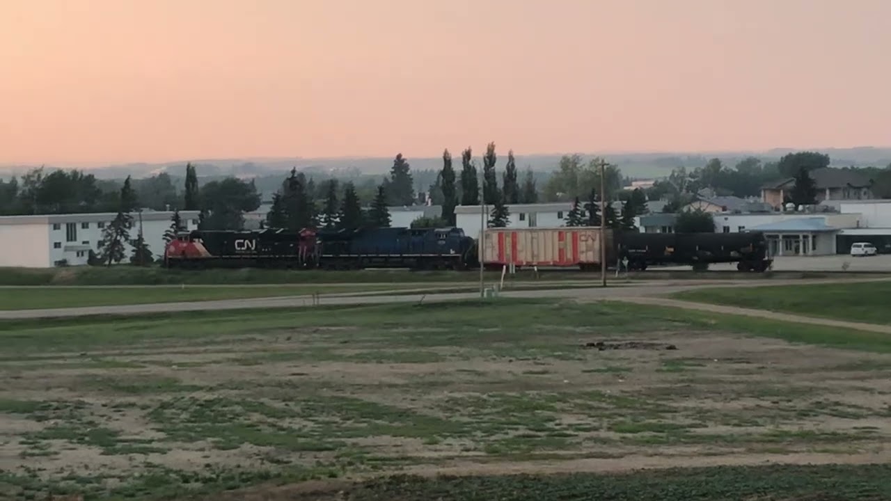 GECX ET44AC!! CN 3189 leads a Northbound local with GECX 2038 and a track inspection boxcar!!