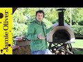 Jamie Oliver shows you how to cook pizza in a wood fired oven