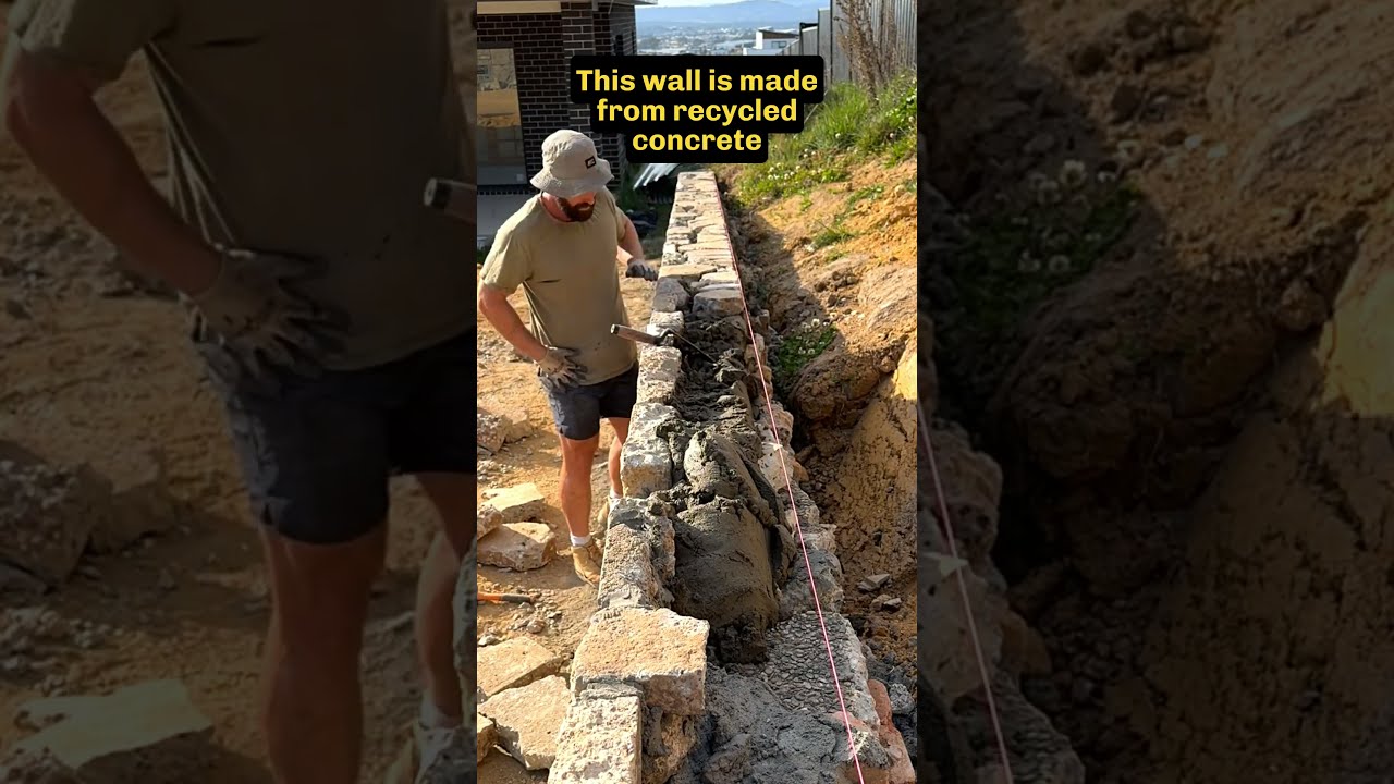 Stonemason Places The Final Stones In A Wall Mason Retainingwalls
