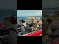 Penguin driving a sport car