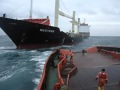 TUGBOAT IN ROUGH SEAS