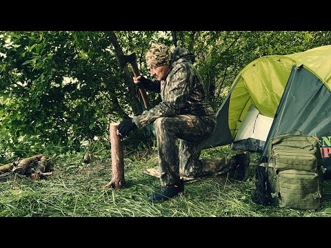 Solo camping. A night in a tent on the river Relaxing with the sounds of nature
