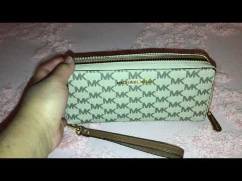 Jet set travel logo continental wristlet natural/luggage
