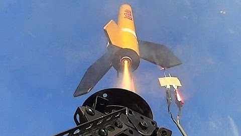 Model Rocket Launch Close Up Under Launch Pad. Explode