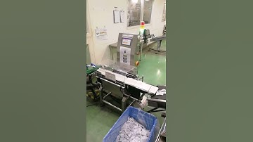 Checkweigher with air blowing rejection system for small bag tea products