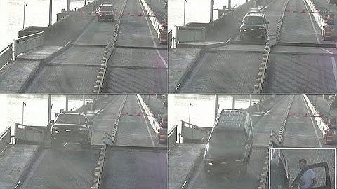 Distracted driver misses sign and JUMPS rising drawbridge