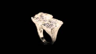 41.78ct cushion cut diamond crossover ring by Hancocks