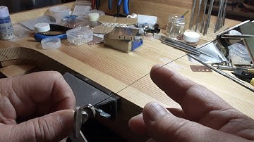 Metalsmith - Loading a saw blade in a basic jewelry saw frame