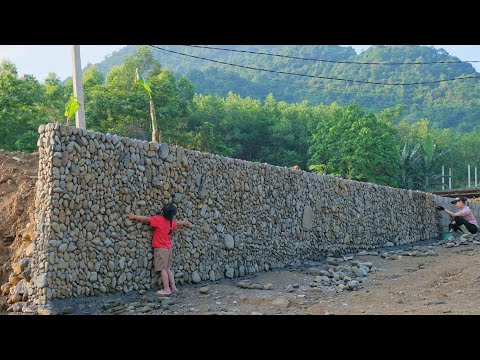 Building a retaining wall to prevent landslides, completion stage / Loan Ở Quê