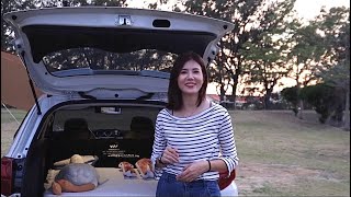 Single camper parking in southern Taiwan, camping by fire, eating barbecue and drinking beer i