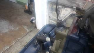 1969 Evinrude 25 HP Sport engine with JB weld and 1972 Johnson cylinder head.