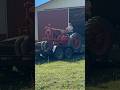 Dragging an Old Farmall F-20 Tractor out of a Barn!