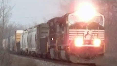 Standing Between 2 Fast Trains