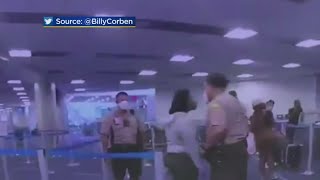 Officer Under Investigation After Striking Woman At MIA