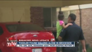 Child found wandering alone in the street