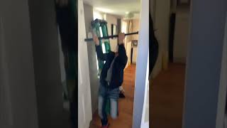 Boy Falls Practicing on a Pull up Bar