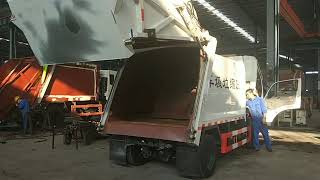 Electric  Compression Garbage Truck at CHTC Factory