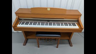 Yamaha Clavinova CLP-340 digital piano and stool in cherry wood