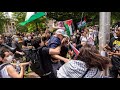 Demonstrators take down american flag at protest on unc campus