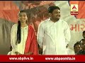 Hardik patel and his wife kinjal on stage at paas program