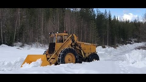 Epic Snow plowing down a remote forest road in Arctic Lapland