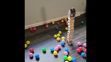 Colorful balls vs Jenga blocks (reversed video)