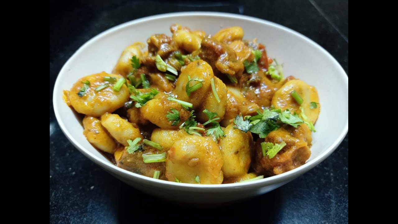 Rice Flour Dumplings in Mutton Curry/Mutton Thikkidi/Break Fast or