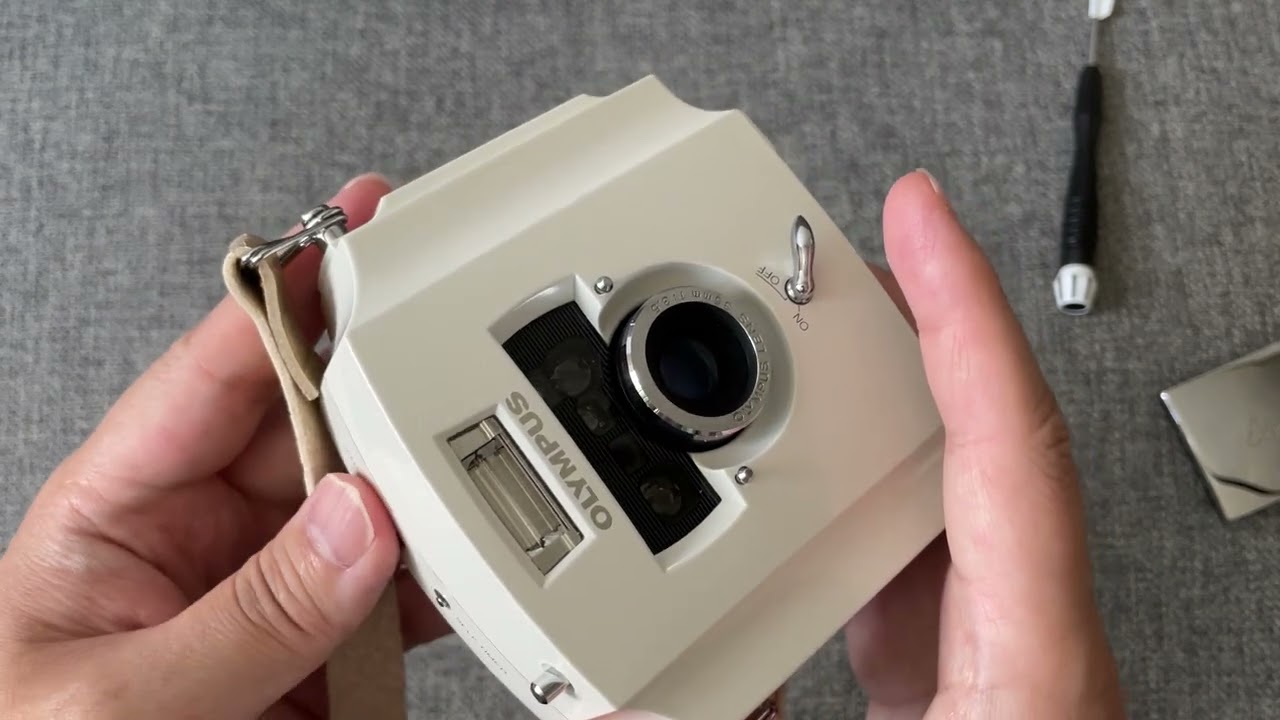 How to Use the Olympus Ecru Film Camera - YouTube