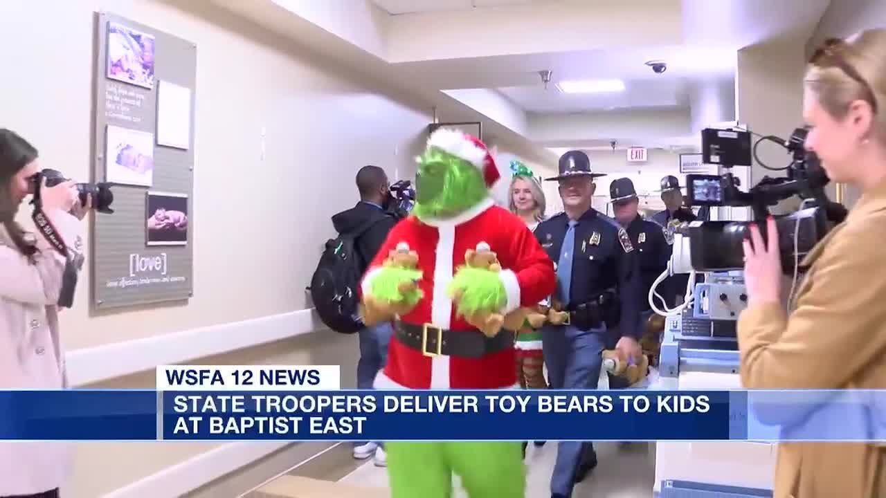 State troopers deliver toy bears to kids at Baptist East - YouTube