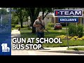 "Good" guy with AR-15 rifle stands at school bus drop-off