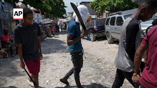 Vigilantes in Haiti strike back at gangsters with brutal street justice