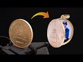 Making a locket from a coin. (transformado una moneda a un relicario).