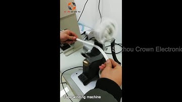 Electrical tape wrapping machine protecting and bundling wire harnesses