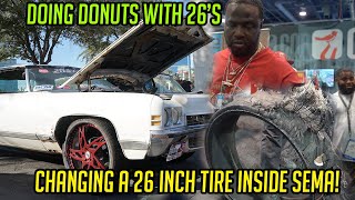 How to change a 26 inch blowout tire inside SEMA