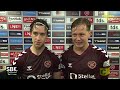 Frankie Kent and Tómas Magnússon react after Hearts snatch Edinburgh Derby win