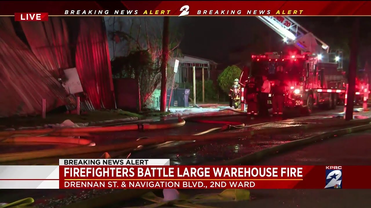 Firefighters battle large warehouse fire - YouTube
