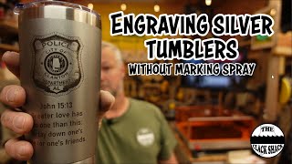Engraving silver tumblers without marking spray