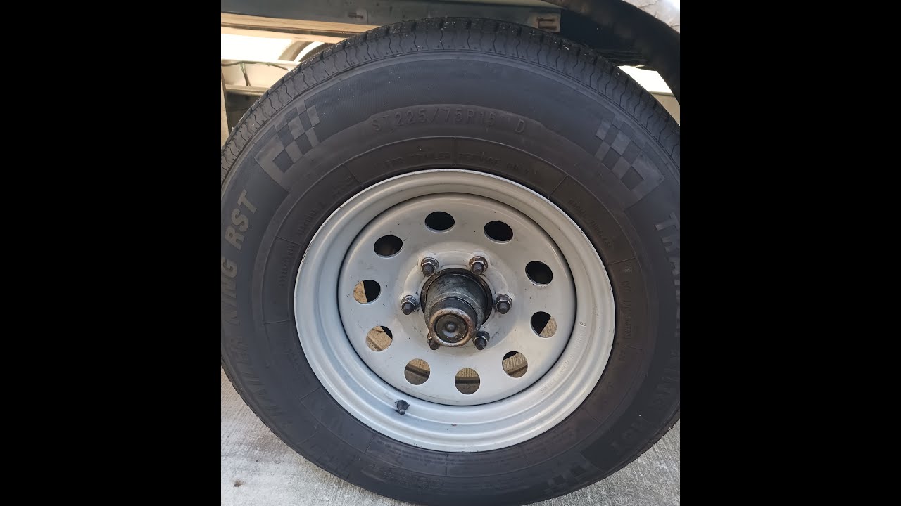 How to pack wheel bearings on boat trailer - YouTube