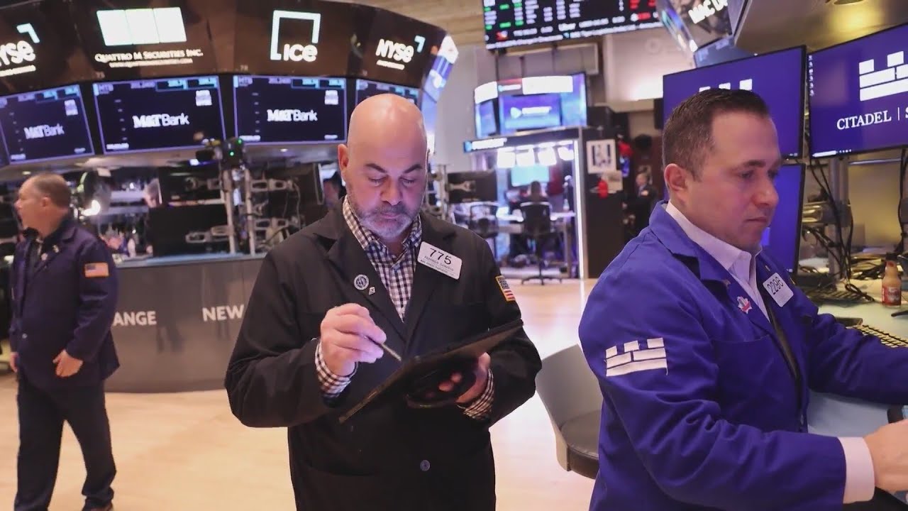 Markets sink as Trump's tariffs roil global trading system - YouTube