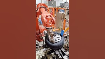 ABB robots skillfully fit tires in a spinning motion!