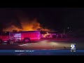 House Fire Threatens Nearby Home