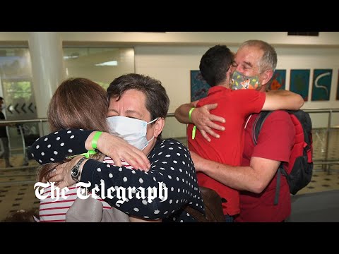 Family and friends reunited as Australia reopens borders after two years of Covid lockdowns