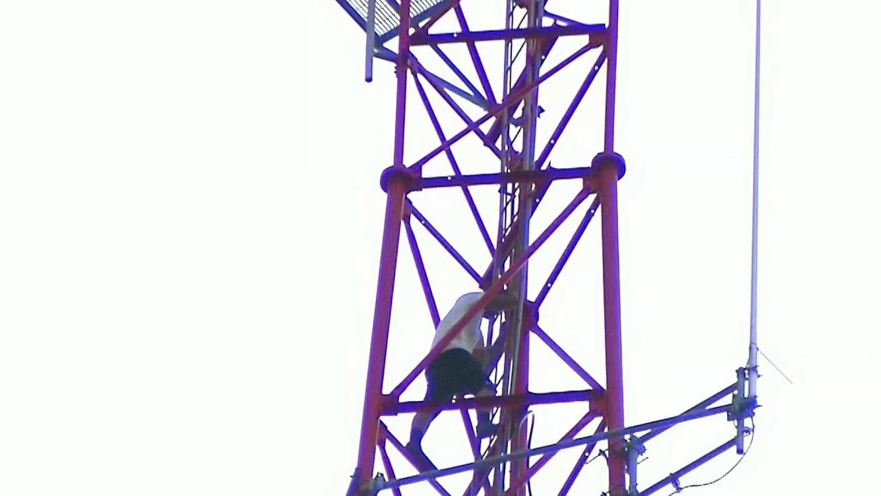 newspaper mockup Man who scaled 400-foot WKMG tower is safe after climbing down 8 hours later