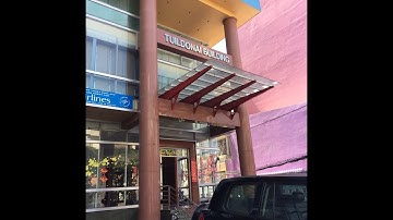 Kho Tư liệu Xây dựng - Ốp đá granite cột tròn | Ốp đá hoa cương cột tròn Mặt tiền toà nhà văn phòng